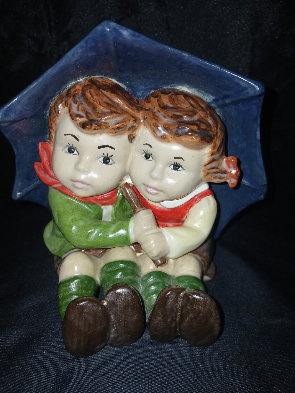 Hand-Painted Ceramic Figurine of Two Children Under Blue Umbrella